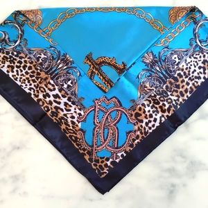 NWT. MOSI Bright blue silk scarf.